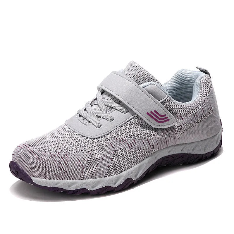 Women's gray purple casual shoes with mesh upper, wedge heel, and Velcro strap.