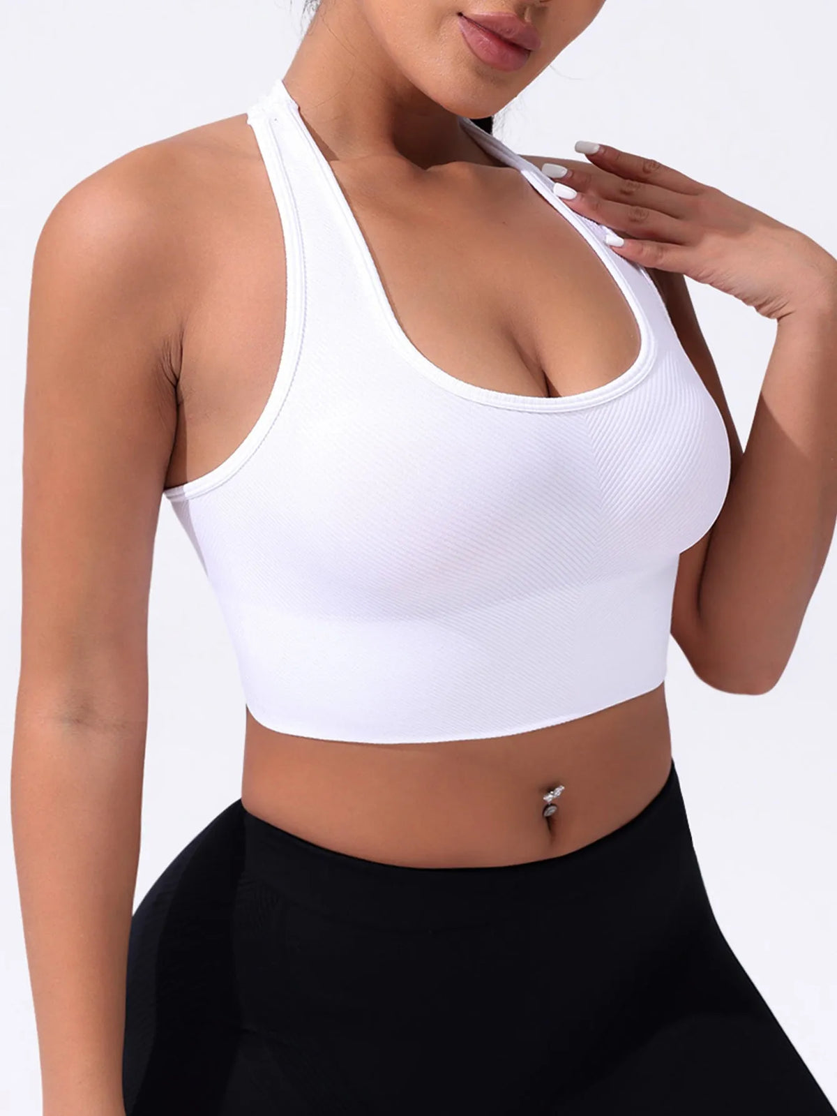Black women's sports bra with fixed double shoulder straps and a full cup design on a mannequin.