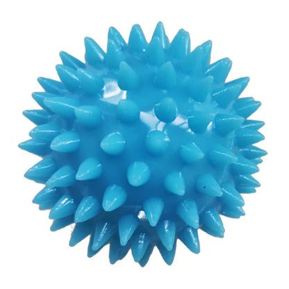 Therapeutic hand grip massager with massage bumps and finger holes for improving grip strength and relaxing hand muscles