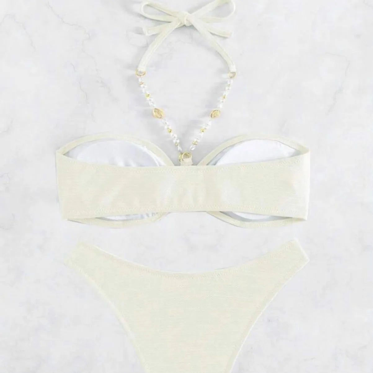 Women's halter beach bikini in solid colour with briefs, polyester spandex construction