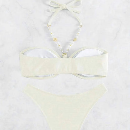 Women's halter beach bikini in solid colour with briefs, polyester spandex construction