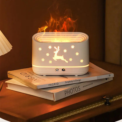White round Elk flame effect humidifier and essential oil diffuser on a surface with mist and light on.