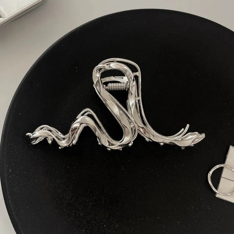 Silver metal hair claw barrette example from a range of 44 Korean-style designs.
