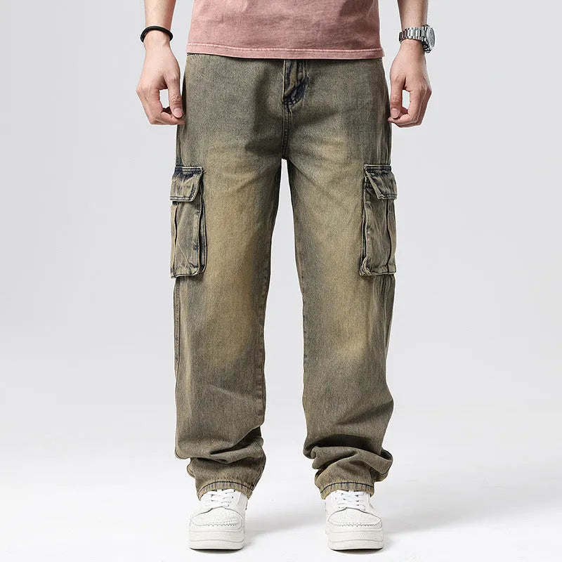 Men's high-waisted loose denim trousers with multiple pockets showing straight leg opening
