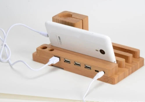 Bamboo charging station with multiple USB ports for charging Apple devices like iPhone, Apple Watch, and iPad