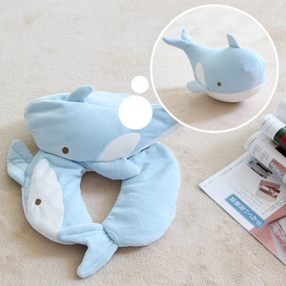 A soft and cozy penguin-shaped neck pillow with a unique U-shaped design for customized neck and shoulder support.