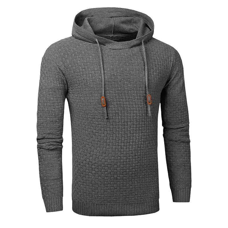 A man wearing a cotton-polyester blend hoodie available in nine colours including black, navy, and red.