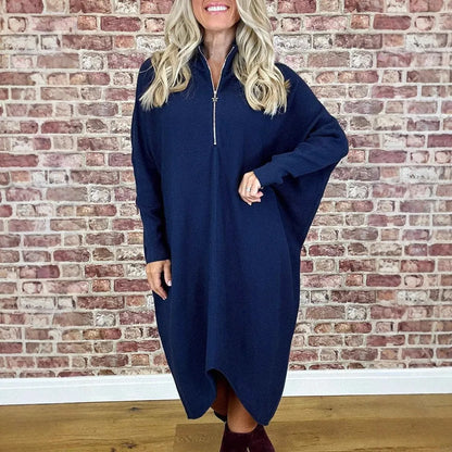 Women's solid colour loose knitted dress with a front zipper and raglan sleeves.