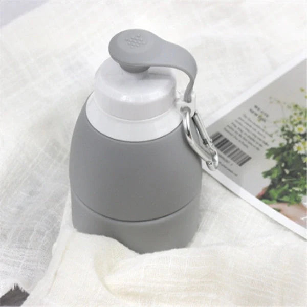 Collapsible silicone water bottle in various colours, perfect for travel and outdoor activities