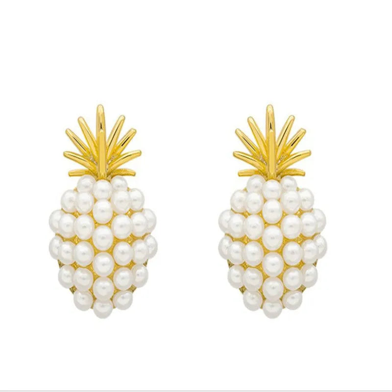 Korean style pineapple and starfish motif earrings with pearl accents in gold, silver, pearl flower, or starfish pearl finish.