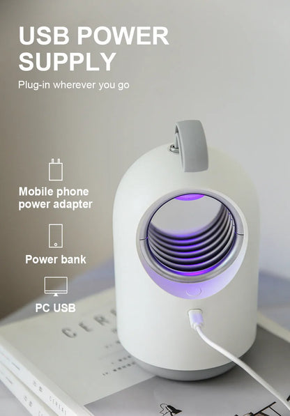White or blue indoor mosquito killer lamp with UV light, a fan, and a silicone carry handle.