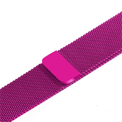 Stainless steel Apple Watch strap in silver on a wrist, showing the metal links and secure clasp.