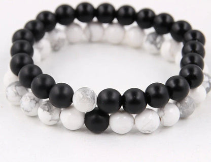 Handcrafted beaded bracelet with seven chakra-representing beads, designed to promote balance and well-being.