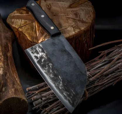 Hand-made stainless steel meat cleaver with a 17cm round head blade on a kitchen surface.