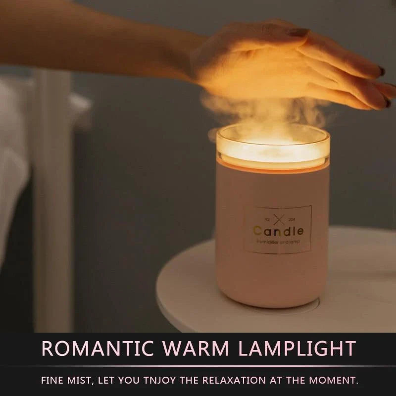 Compact USB-powered mist humidifier with mood light, available in fresh green, rose powder, and black colors