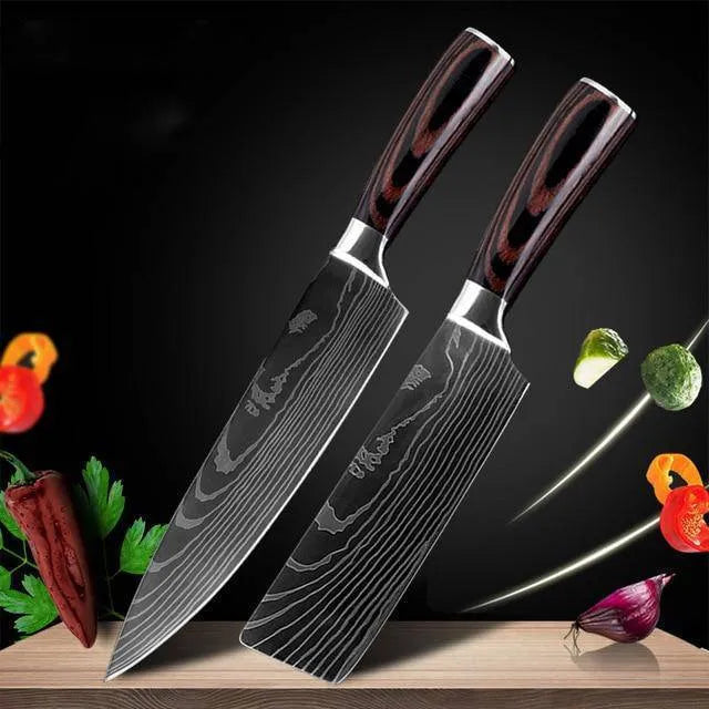 7-inch chef knife with laser Damascus pattern on blade and coloured steel handle on a cutting board.