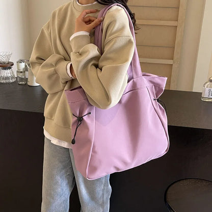 Soft Oxford cloth foldable commuter tote bag in street trend style, shown in available colours.