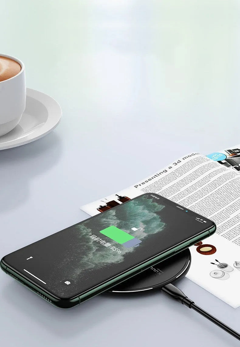 Wireless charging disc for mobile phones providing 200mA charging current through Micro USB interface with indicator function, available in black colour