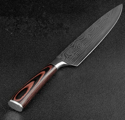 7-inch chef knife with laser Damascus pattern on blade and coloured steel handle on a cutting board.