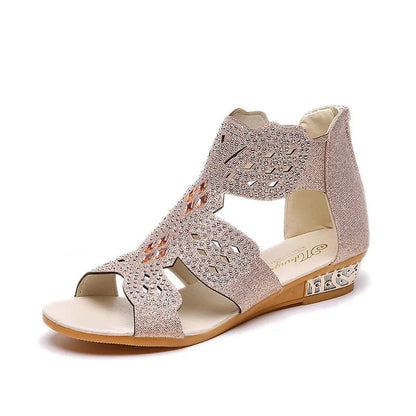 Women's black open toe flat sandals with rhinestone details and back zipper closure
