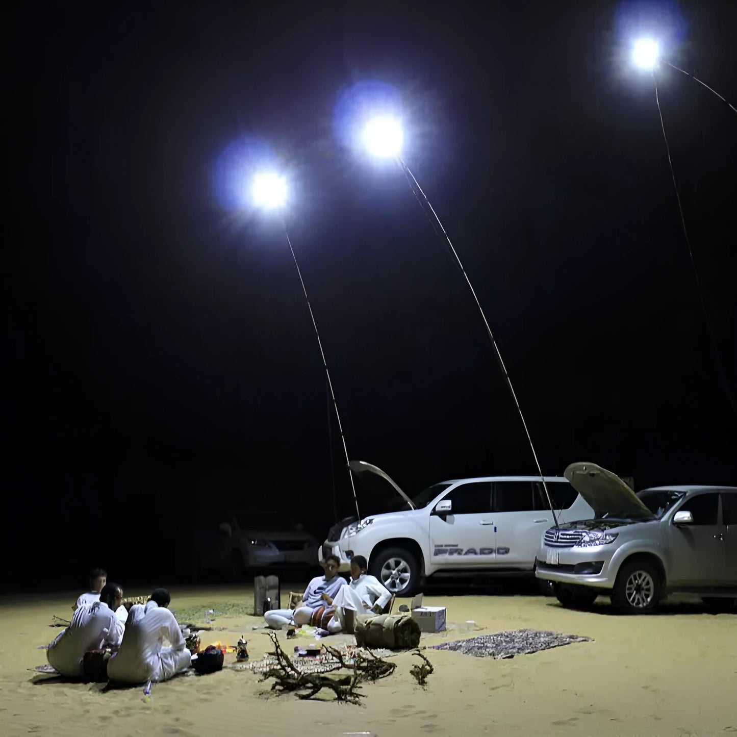 White LED fishing rod light unit with remote control, mounted on a rod for night fishing illumination.