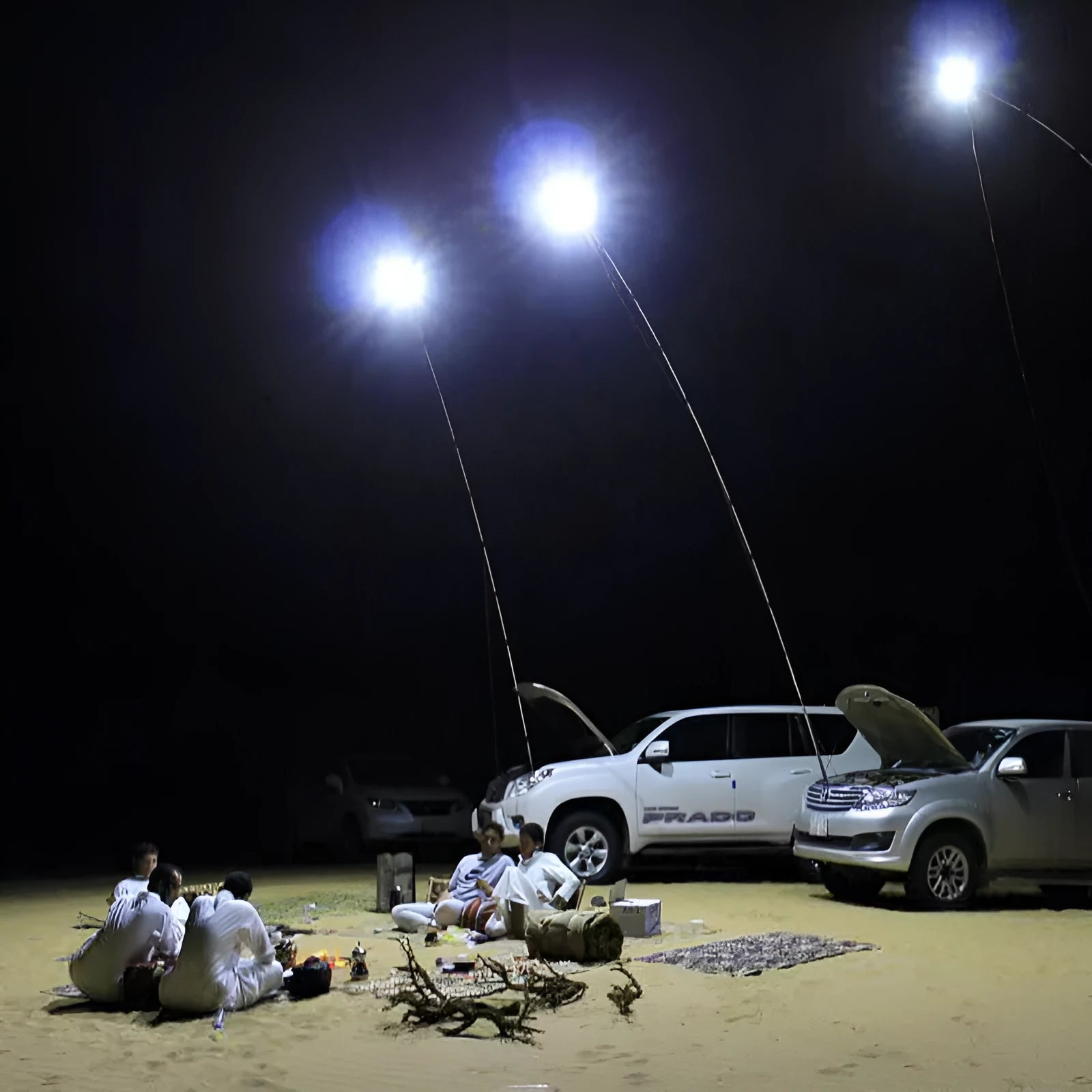 White LED fishing rod light unit with remote control, mounted on a rod for night fishing illumination.