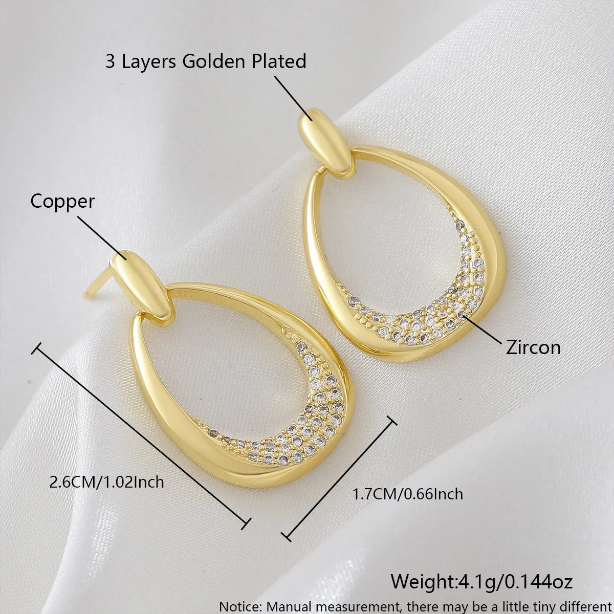 Women's yellow gold geometric drop earrings with oval and round elements on a white background.