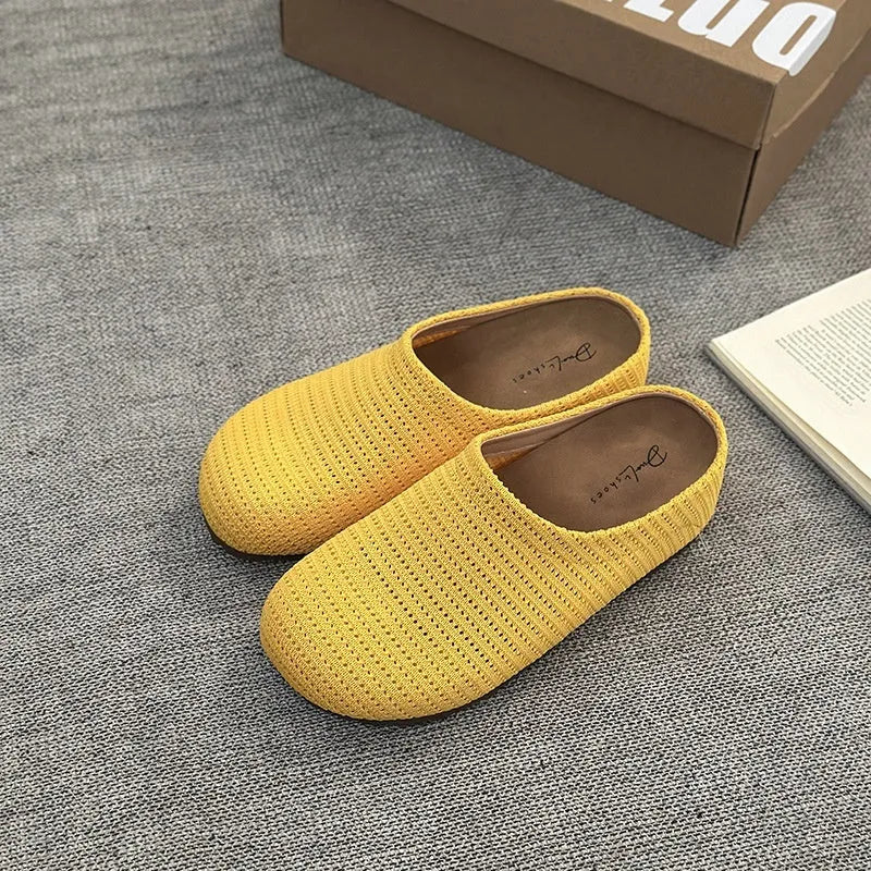 Baotou Boken women's cloth upper slippers with rubber sole in beige, shown in a leisure setting.
