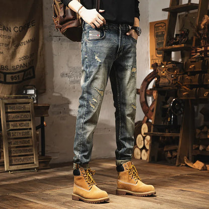 Men's vintage blue straight-leg jeans with a fleece lining and drawstring waist closure.