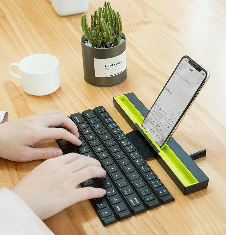 Wireless folding keyboard with Broadcom Bluetooth technology for portable office use