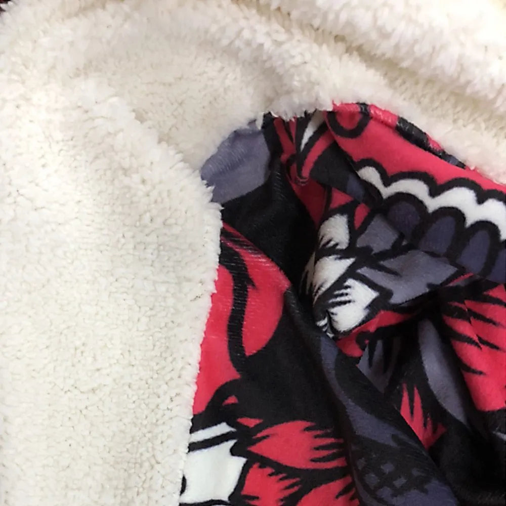 Round flannel burrito blanket with food-themed printing, showing coral fleece texture and wrap-style design