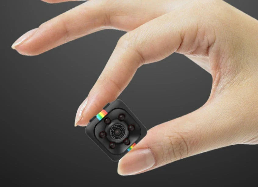 SQ11 Mini Camera with 1080P HD video, night vision, and infrared recording for capturing high-quality footage