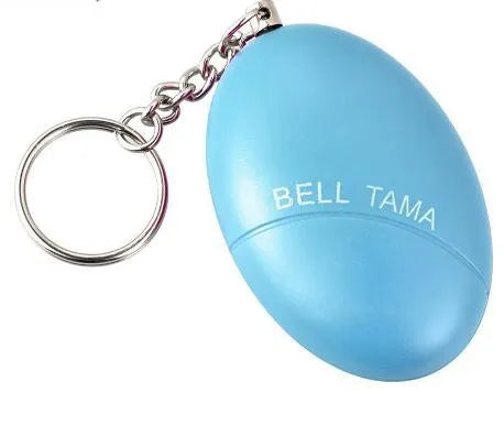 Compact black personal alarm keychain with pull-ring for loud siren activation, shown next to a ruler showing 6cm length.