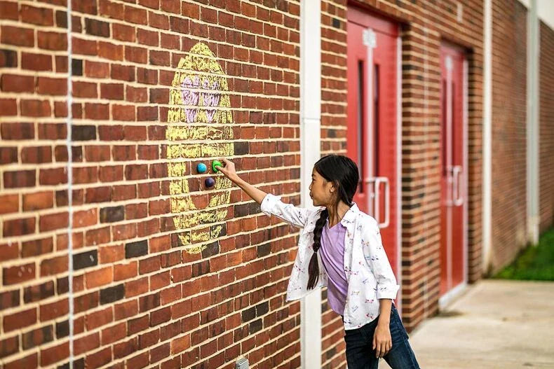 Colorful, luminous stress relief balls with a sticky surface for bouncing, squeezing, and sticking to surfaces