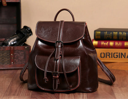 Korean style cowhide leather backpack in black with front sandwich pockets and internal organisation compartments