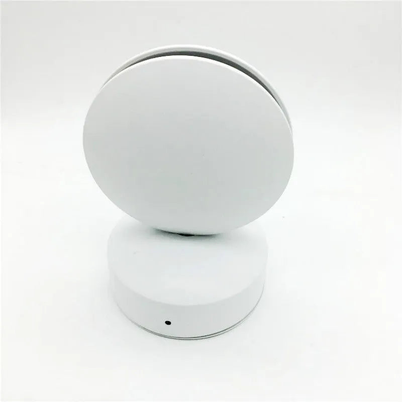 Aluminium LED spotlight bar wall lamp with glass lens, shown in a corridor setting.