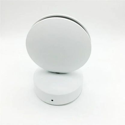 Aluminium LED spotlight bar wall lamp with glass lens, shown in a corridor setting.