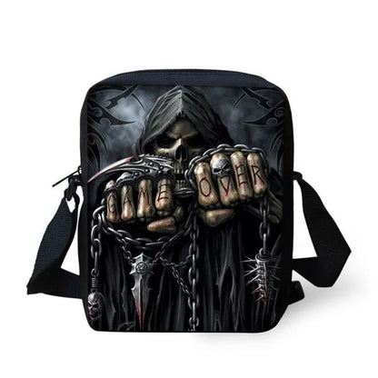 Skull print children's messenger bag with adjustable double straps and zipper closure, shown in a casual setting.