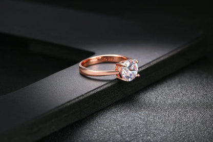 Close-up of a beautiful rose gold ring with sparkling zircon stones