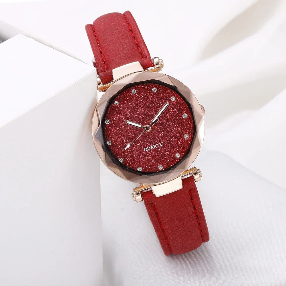 Elegant women's wrist watch with a captivating starry sky dial and leather strap, suitable for any occasion.