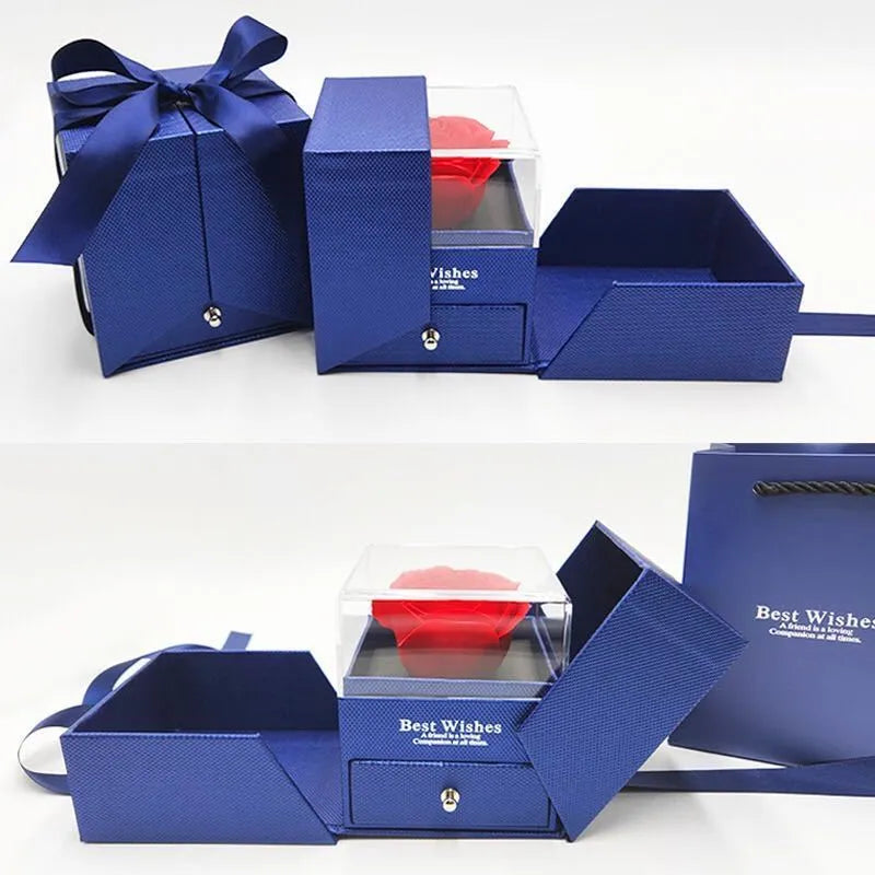 Cardboard jewellery gift box with inner packaging compartments, shown in pink colour.
