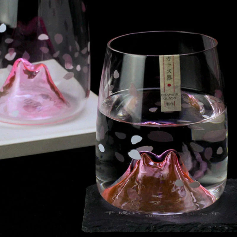 Elegant Japanese crystal glass tumbler with intricate cherry blossom design, perfect for enjoying whisky, spirits, and cocktails