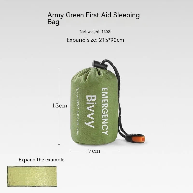 Orange emergency tent with sleeping bag and blanket disaster relief kit on ground