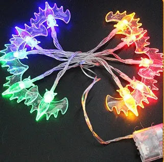 Halloween LED string lights with bat, ghost, and pumpkin pendants on a 1.2 metre white cable.