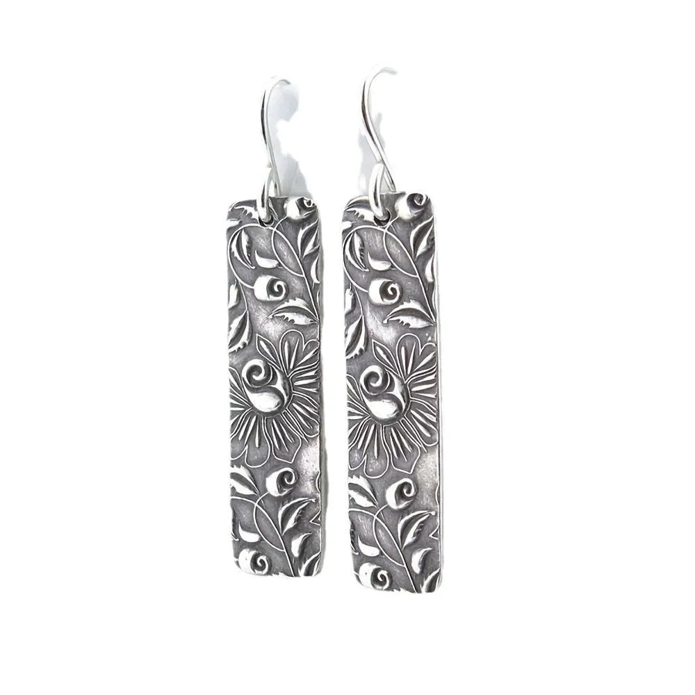 Geometric long earrings with carved vine pattern in silver zinc alloy