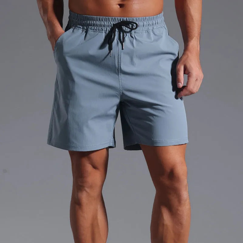 Men's loose-fitting casual shorts in quick-drying polyester available in four colours