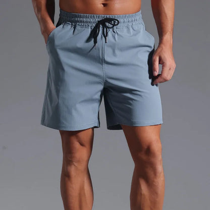 Men's loose-fitting casual shorts in quick-drying polyester available in four colours