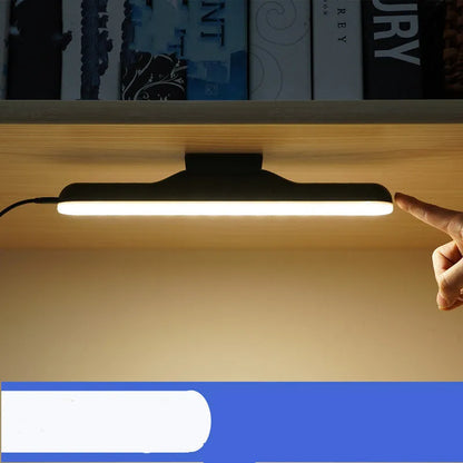 Modern plastic LED desk lamp with touch-sensitive dimming controls and rechargeable battery