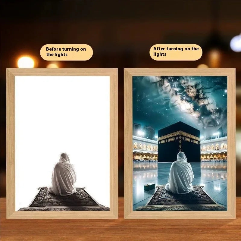 Modern rectangular light painting photo frame displaying an illuminated cross and scenic artwork.