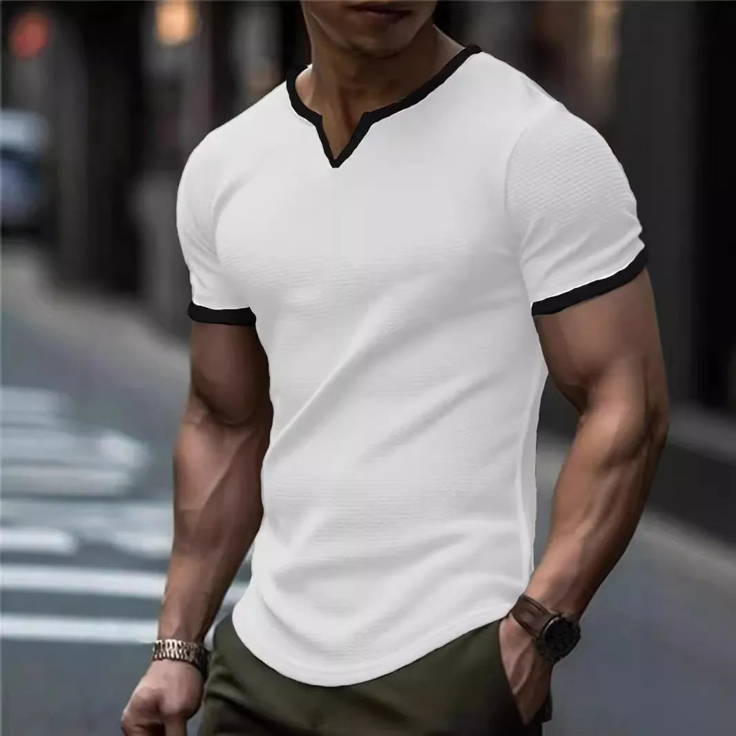 V-neck colour-block waffle texture outdoor sports T-shirt in polyester fabric on a neutral background.